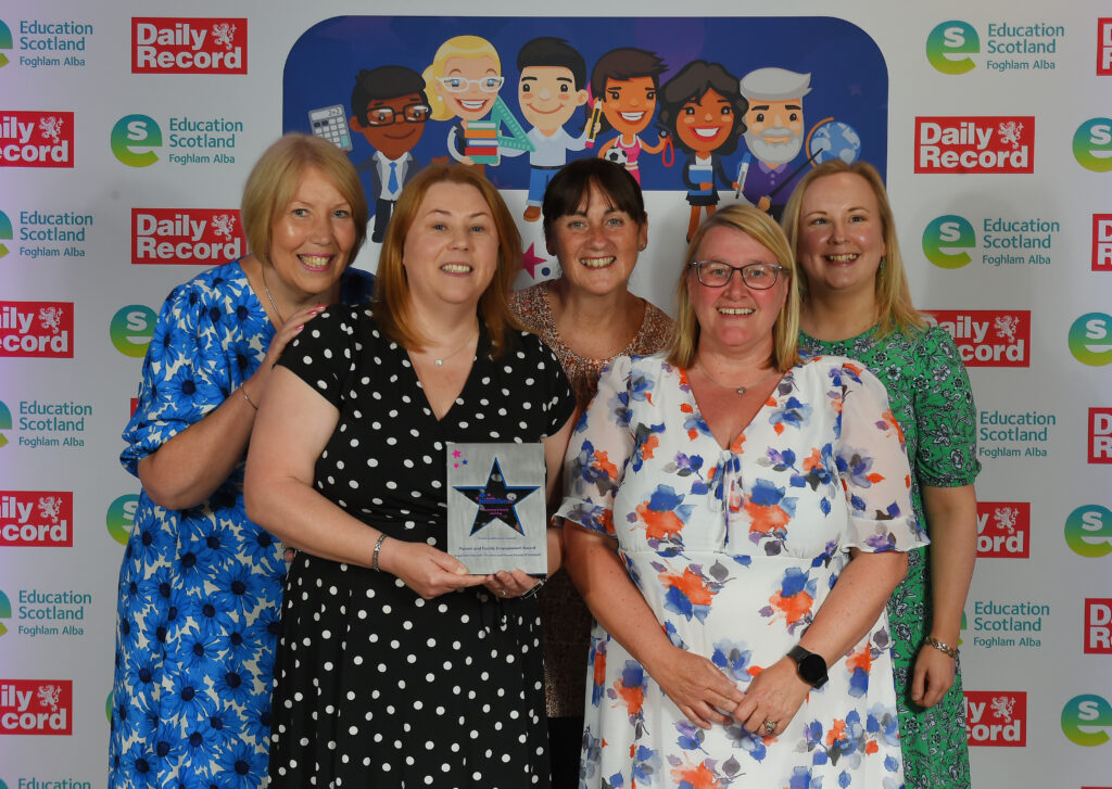 Scottish Education Awards 2023 Winner - Parent and Family Engagement Award Parenting & Family Learning, Perth and Kinross Council team:Alison Houghton, Yvonne Skillin, Rhona Cameron, and Megan Campbell with NPFS chair, Cheryl Burnett.